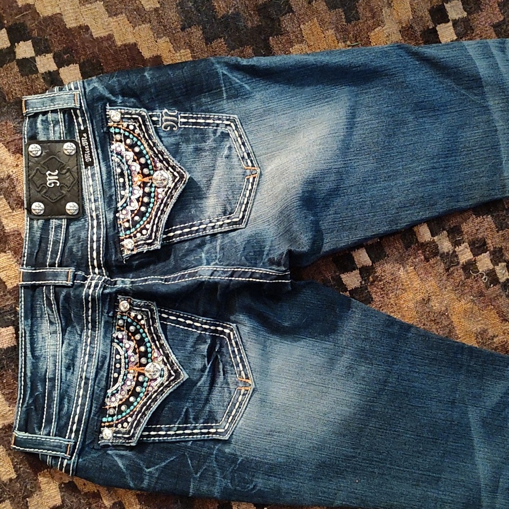 Miss Me Signature Boot jeans Great designs on pockets